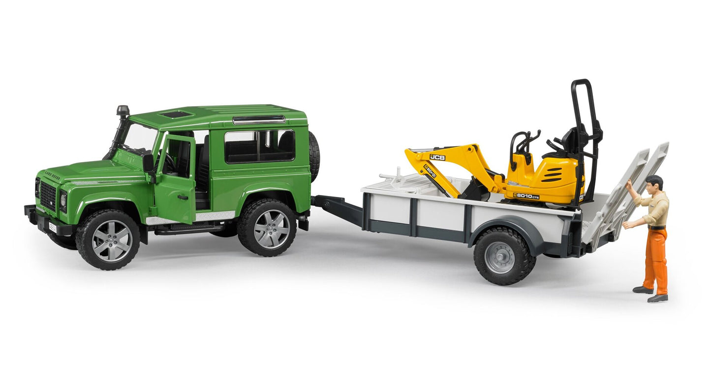 Land Rover Defender s prívesom a bagrom JCB U02593